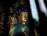 Kathmandu Swayambhunath 46 Amoghosiddhi North Dhyani Buddha Statue Behind Mesh 